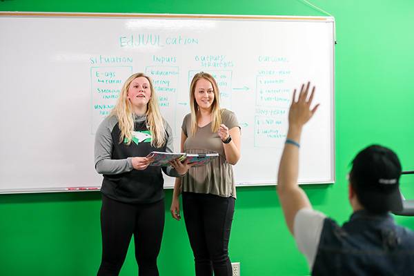 Public Health Education Students in front of class