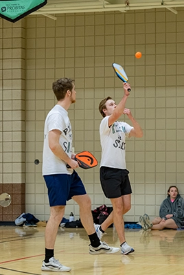 Student playing pickleball